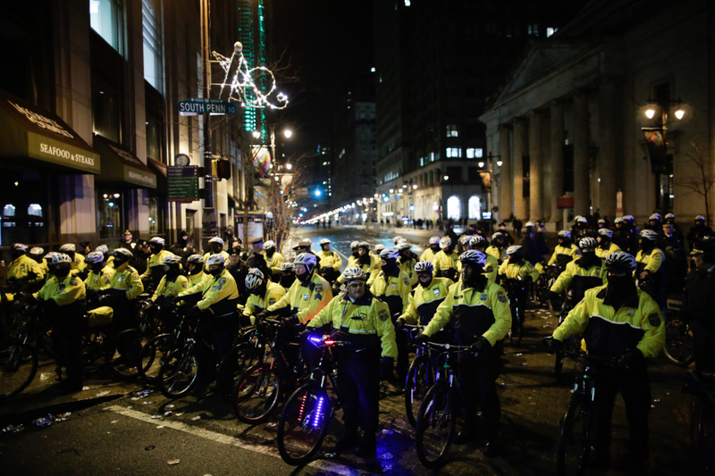 Philadelphia police officers try to keep fans away from City Hall as fans celebrate the Philadelphia Eagles’ victory in Super Bowl LII against the New England Patriots in the early morning hours of Feb. 5, 2018, in Philadelphia. (Eduardo Munoz Alvarez/Getty Images)
